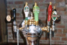 Keg Stools Around Bar Table and Beer Tower